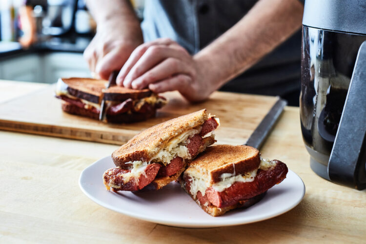 A hot dog Reuben is the deli classic you didn’t expect  to make in an air fryer